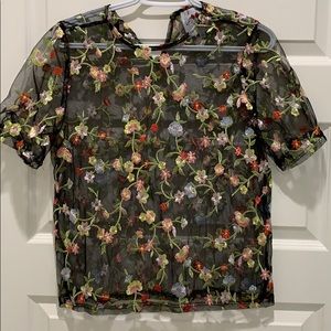 Cute see through floral top.